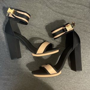 Black and nude pumps